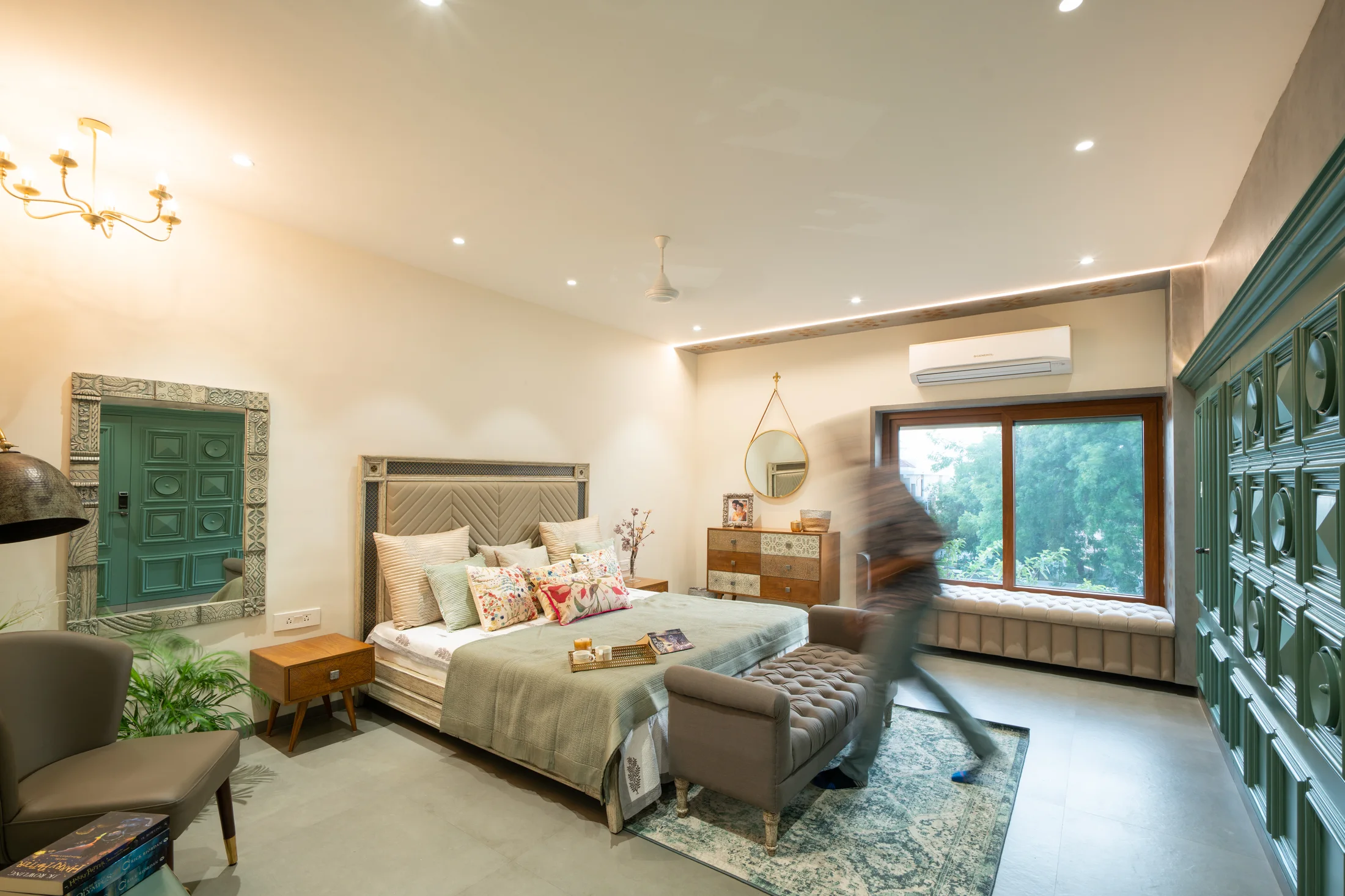 Bedroom with custom furniture and layered lighting