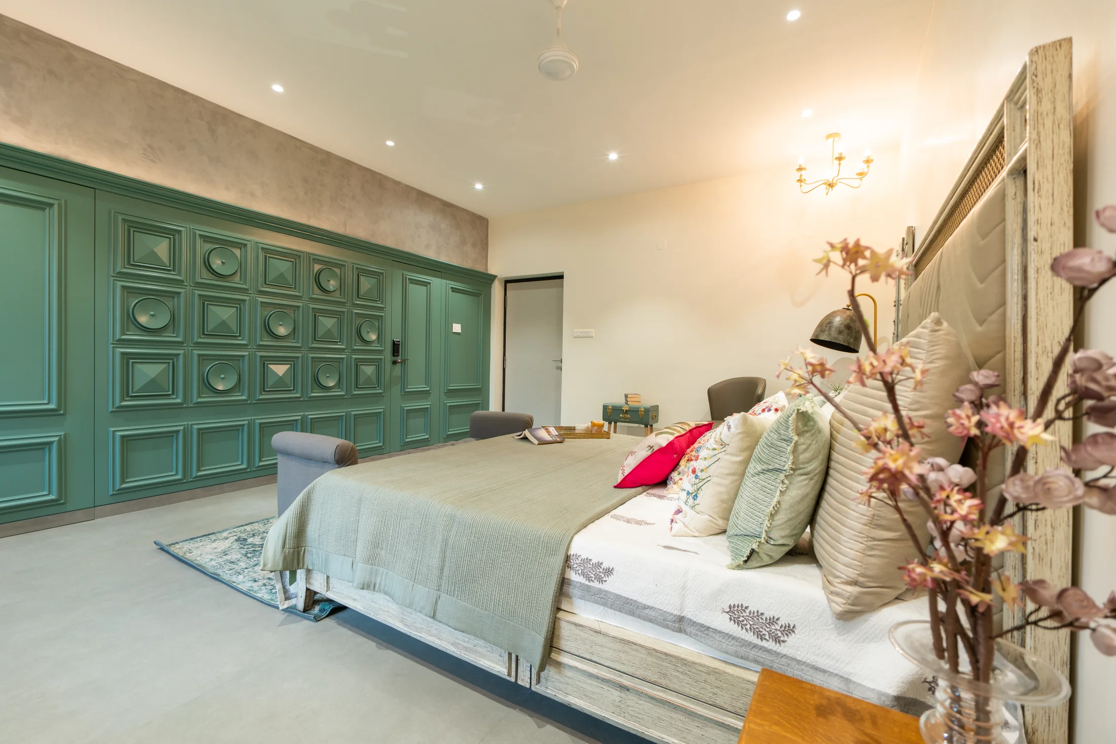 Upholstered bed and detailed wall panelling