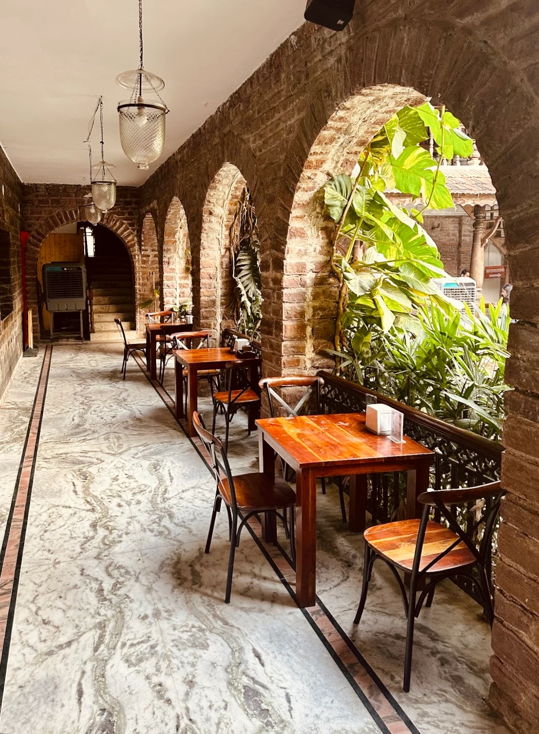 Arched stone verandah and stone floor