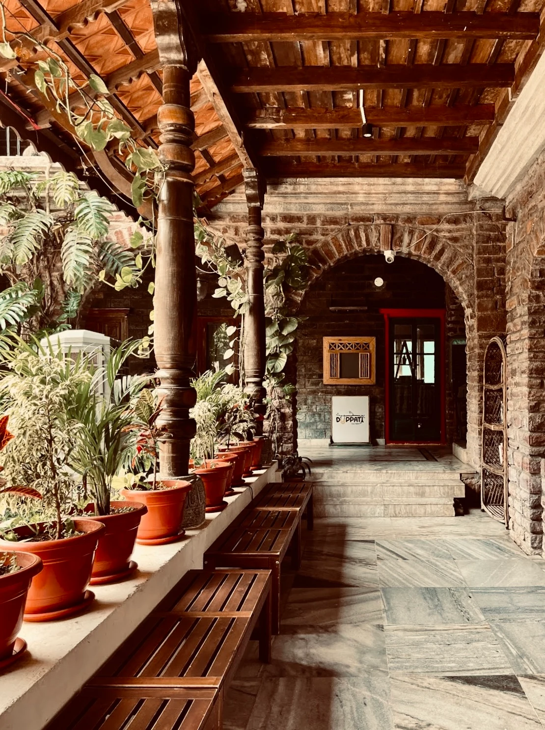 Deep colonnaded passage through the residence