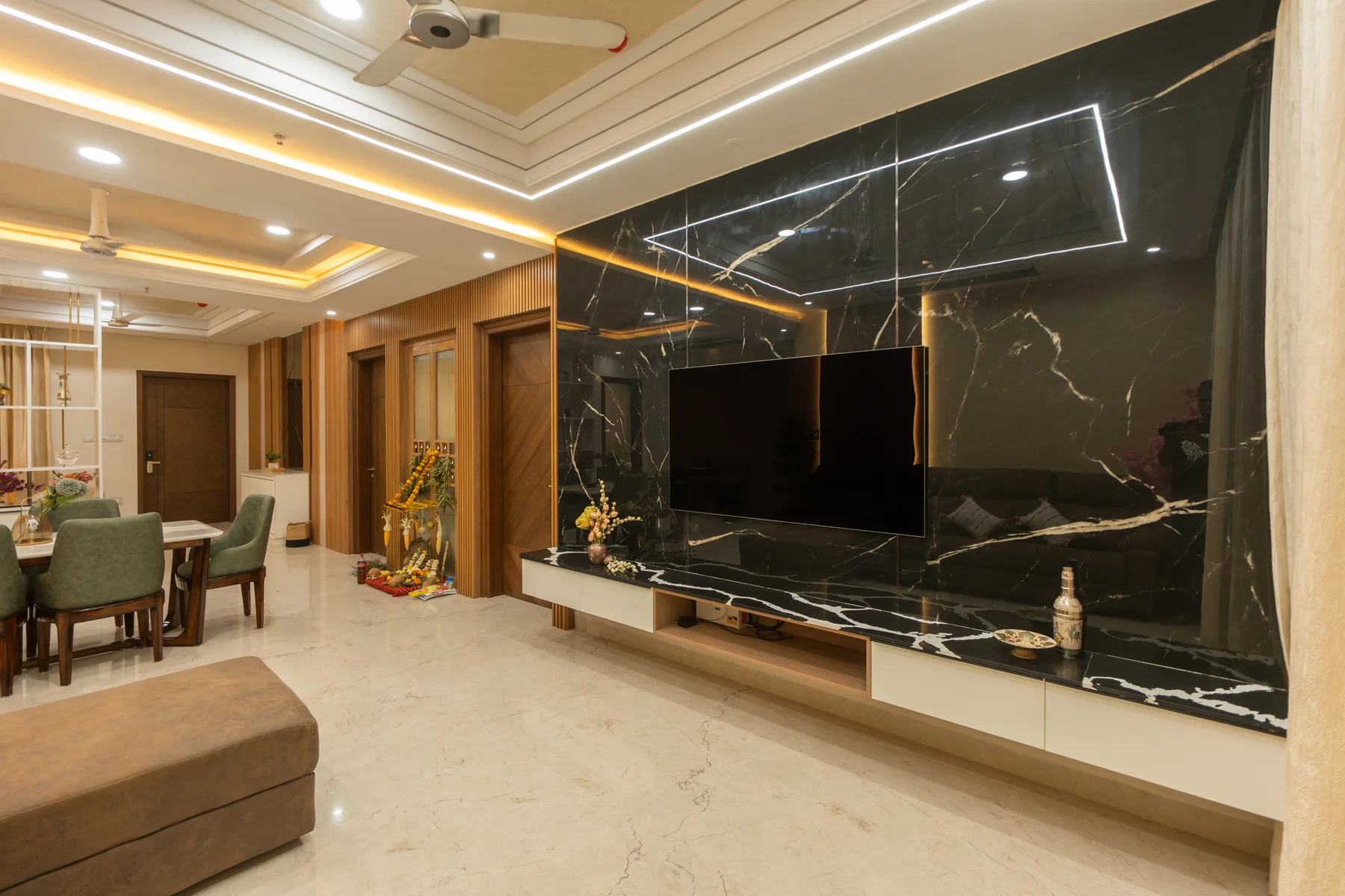 Living room with dark stone media wall