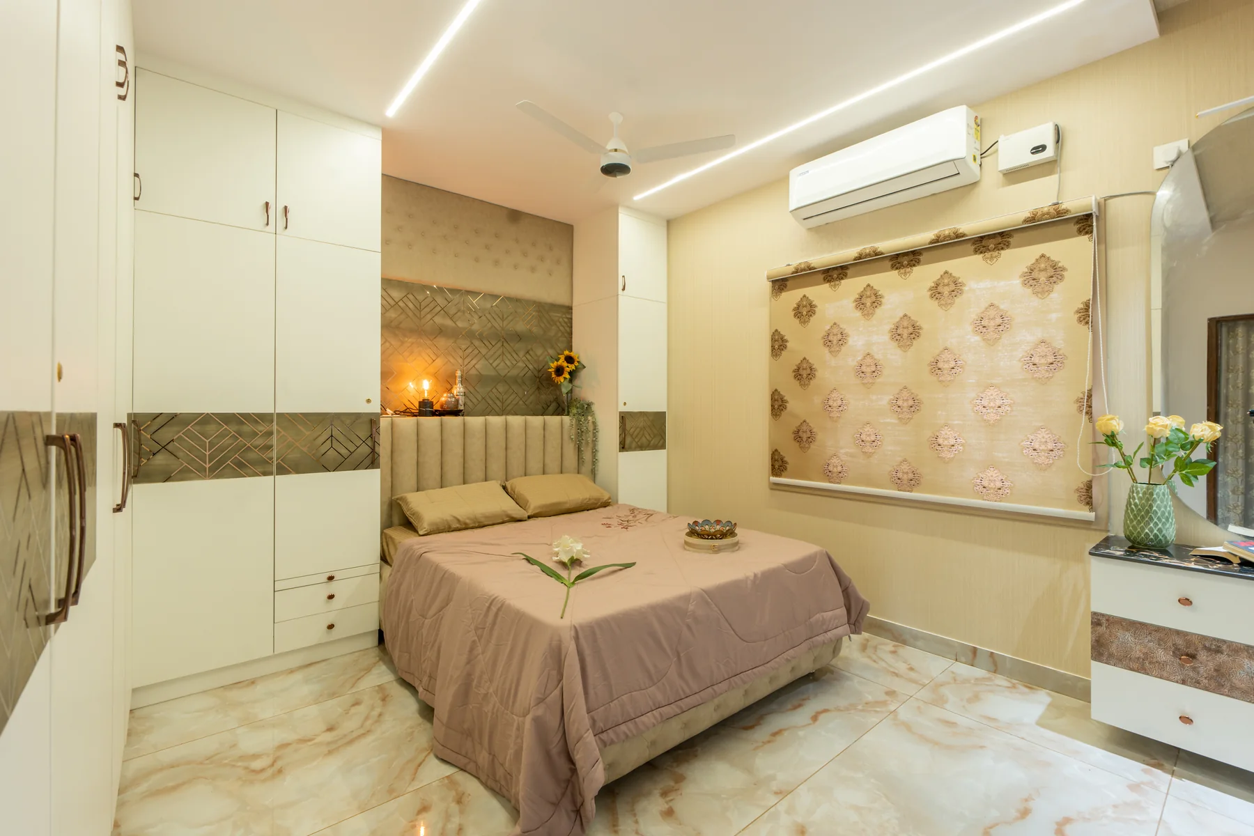 Bedroom with full-height cabinetry